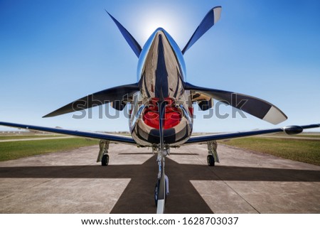 sports plane on a  runway waiting for take off Royalty-Free Stock Photo #1628703037