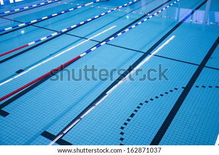 Swimming pool with race tracks or lanes Royalty-Free Stock Photo #162871037