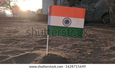 beautiful tricolour flag and green background. 26 January 2021 great indian republic day festival. Indian flag in empty field
