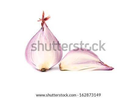Half and slice of red onion. Isolated on a white background.