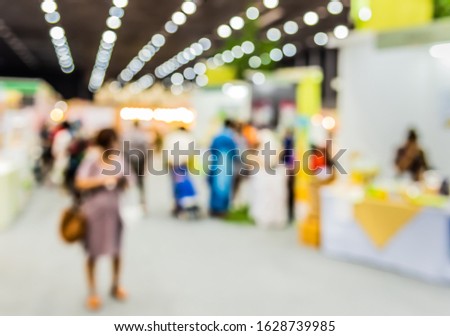 Abstract Blurred Shopping mall or Exhibition hall with bokeh for background usage.