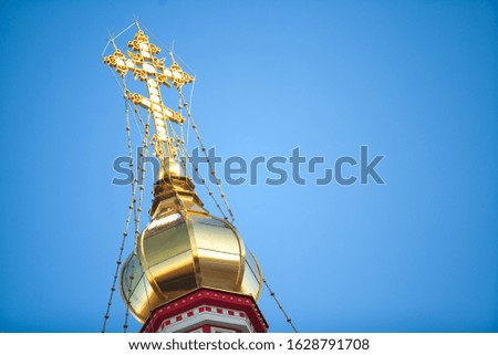 Dome with a cross of the Ascension Cathedral in Almaty