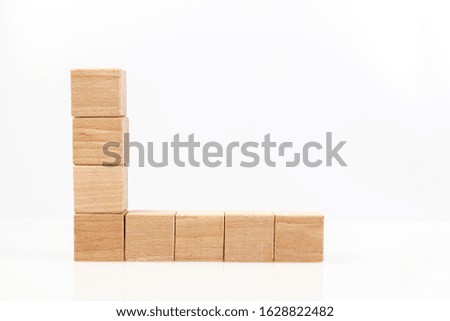 Wooden cubes on a white background close up