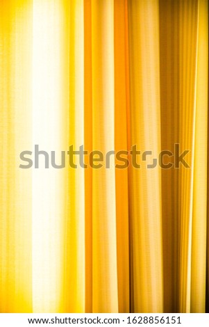 Yellow Stage Curtain. Curtain Background. Abstract background. diagonal lines and strips.