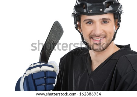 Close up Smiling male hockey player. Isolated on white, looking at camera