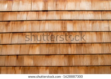 Wooden clapboard on the side of a house