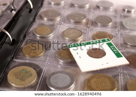 Many coins of different countries and the times of their use. Numismatics. Hobby