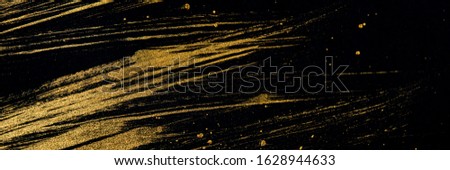 Golden curved lines on a black background. Abstract background. Web banner. texture graphic design smooth background beautiful digital abstract colorful modern art