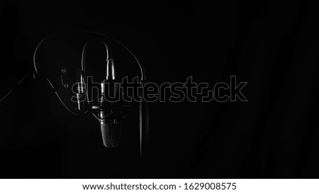 Studio Microphone isolated on a white background. Banner
