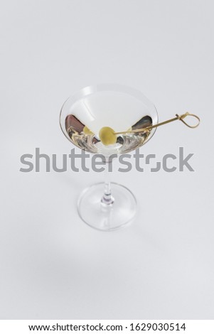 glass of alcoholic coctail with ice