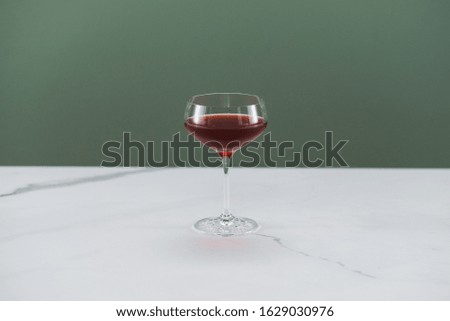 glass of alcoholic coctail with ice