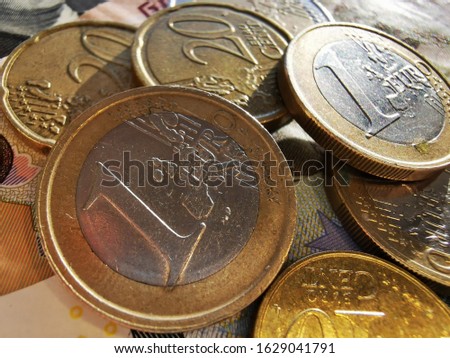 Euro coins and Euro cents. Paper notes of Euro, dollar and Russian rubles. Exchange rate. Buy currency sign. Exchange money. Dollar money cash. Investment concept.