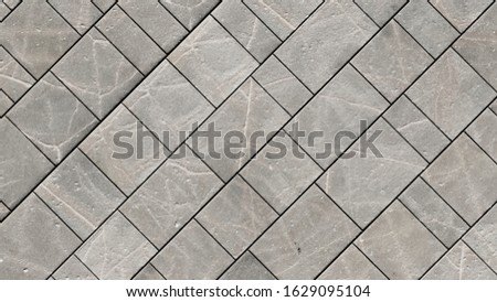 Black and white exposure of tiles as background texture surface.