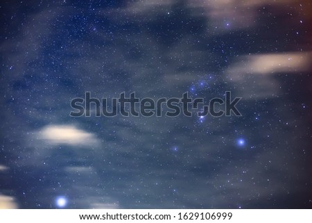 Sirius Star and  Orion Constellation in the night sky.