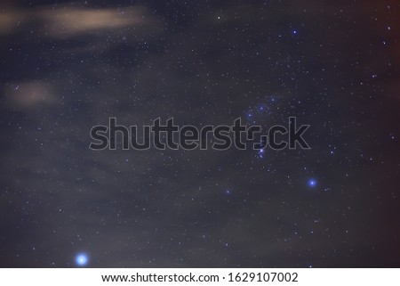 Sirius Star and  Orion Constellation in the night sky.