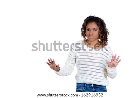 Closeup portrait of beautiful shocked young woman raising hands up to say no stop right there, isolated on white background copy space to left. Negative human emotion facial expression sign symbol Royalty-Free Stock Photo #162916952