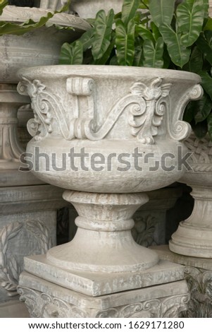 White concrete pots in the garden