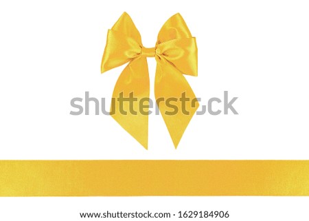 Gold yellow ribbon bow isolated on white background