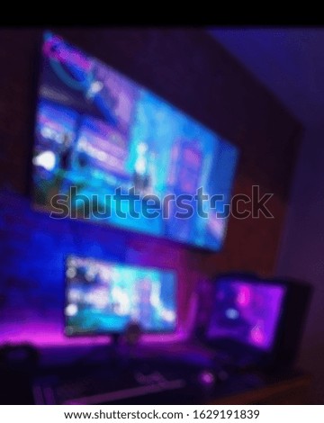 Colorful LED lights of pc gaming equipment on blurry perspective. suitable for gaming pc concept.