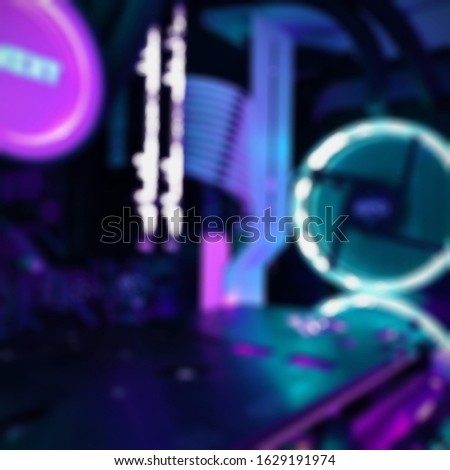 Colorful LED lights of pc gaming equipment on blurry perspective. suitable for gaming pc concept.