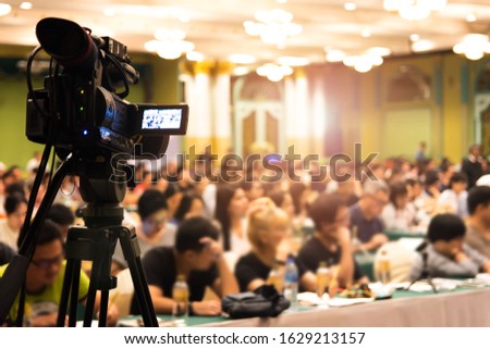 Abstract blurred photo background of business people in conference hall or seminar room.
Bokeh business meeting conference training learning coaching concept.
