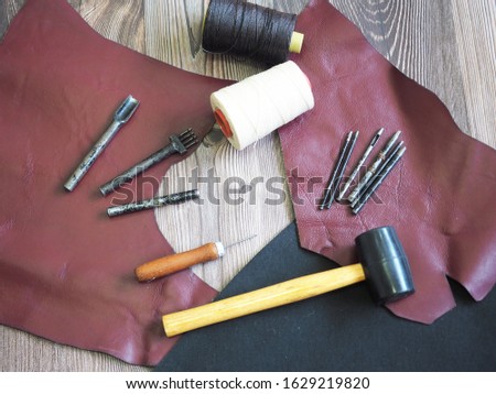 Equipment for making leather bags. Leather shoes. Hand work. Hand made tools for fixing or repair genuine leather bags or Shoes.hand craft concept
