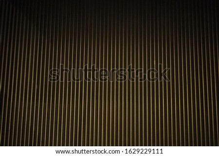vertical lines steel escalator close up texture, surface and background