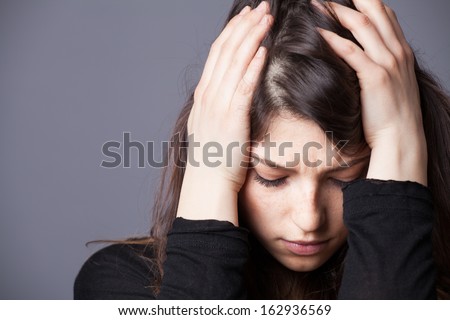 This young woman is going through some tough times Royalty-Free Stock Photo #162936569