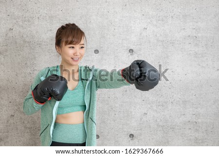 The woman who boxes by sports gym