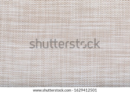 abstract woven synthetic rug texture, macro closeup