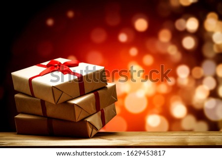 Valentine's Day background of gifts and red blurred background.Desk of free space for your decoration and love time. 