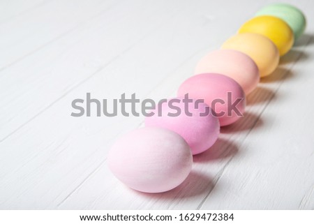 A row of multi-colored Easter eggs
