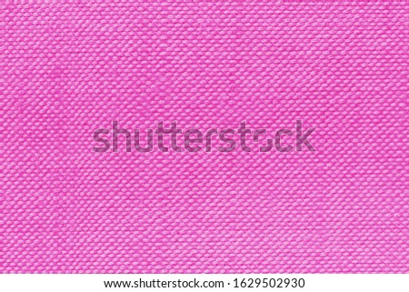 Fabric texture background in pink - rose color for New Year, Christmas and Valentine's day.