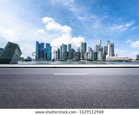 city skyline with asphalt road in singapore