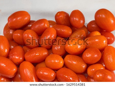 Ripe cherry tomatoes . Extreme Close Up. Isolated. Stock Image.