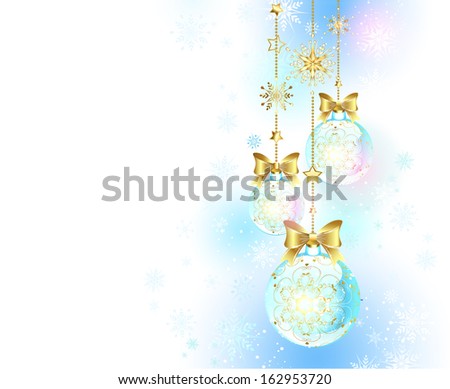 Christmas balls decorated with gold pattern on white background with snowflakes.
