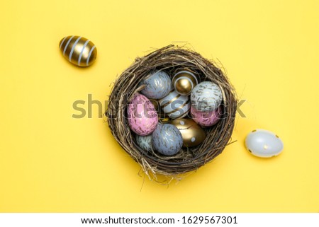 Easter basket eggs isolated on yellow. For greeting card, promotion, poster, flyer, web-banner, article