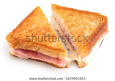 Classic cheese and ham toasted sandwich cut in half isolated on white. Royalty-Free Stock Photo #1629601651