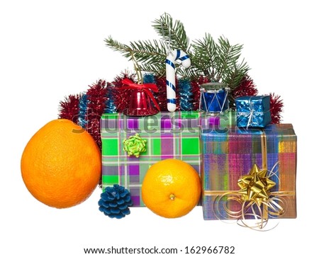 Fresh tangerines with a gift packages isolated on white background