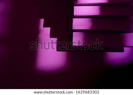Amazing stairs with pink light and shadows. Abstract and magical design. Cube. Square.  