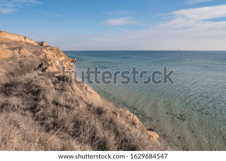 seashore and surf on the beach, no people, secluded vacation spot