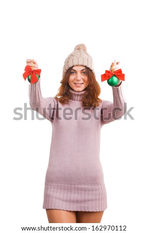 Young woman with christmas ball isolated on white