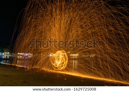 Long exprosure picture style.Fireworks show on the beach at Samed Island in Rayong province of Thailand.