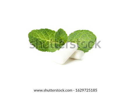 Mint leaves and gum isolated on white background