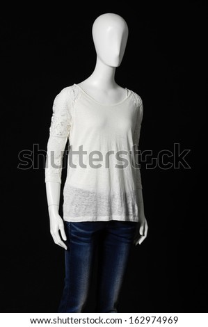 Mannequin female dressed in shirt and trousers  