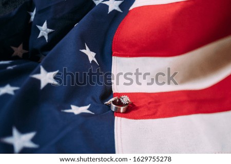 Engagement Rings over the American Flag