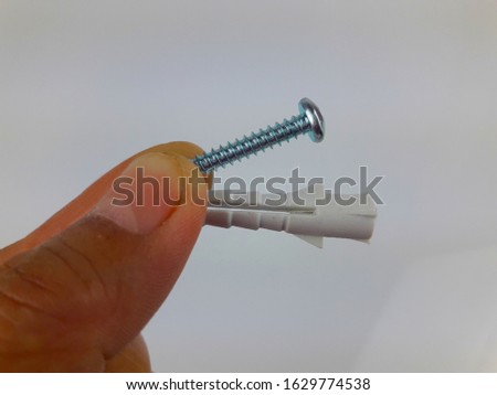 hand  with  screw  on  white  background  image
