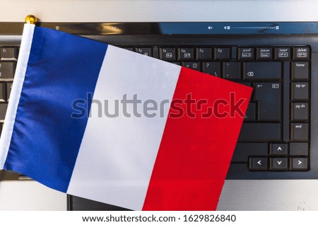 flag of France on computer, laptop keyboard