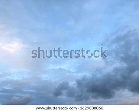 Atmosphere of overcast sky before to rainy. Dark cloudy floating on blue sky. 