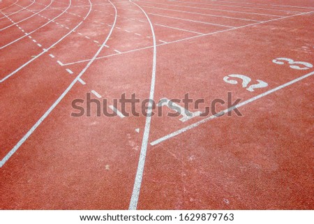 Background of running track surface with number one, two and three and intersection lines